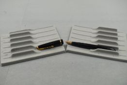 A Parker Slimfold fountain pen in black with single decorative band to cap with Parker 5 nib. Approx