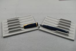 A Parker Duofold fountain pen in blue with broad decorative band to cap having Parker Duofold 4 nib.