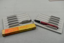 A Platignum Golden Platignum leverfill fountain pen in pink with ribbed steel cap in original box.