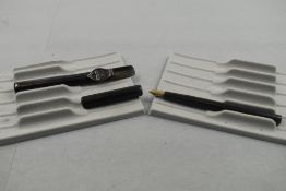 A Mabie Todd Blackbird clipless Eyedropper fountain pen in Chaised hard Rubber with Swan pocket clip
