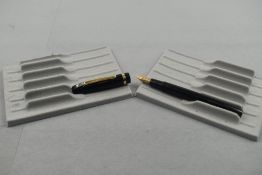 A Mabie Todd Swan twist fill fountain pen in black with broad band to the cap having a Swan 3 nib.
