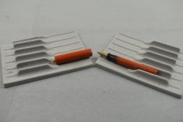 A Sheaffer Flat Top Ladies leverfill fountain pen in orange with single band to ring top cap