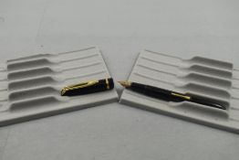 A Watermans L2 leverfill fountain pen in black with narrow band to cap having Waterman NW2 nib.