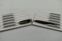 A Conway Stewart 84 leverfill fountain pen (slight kink in lever) in black with broad band to the