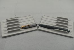 A Parker 51 in grey with steel cap with gold trim (ENGRAVED). Approx 13.7cm