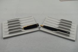 A Parker Victory fountain pen in black with single decorative band to cap having Parker 10 4 nib.