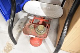 A set of vintage kitchen balance scales and weight set