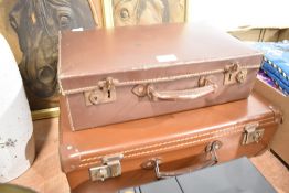 Two 20th century small luggage cases or childrens suitcase