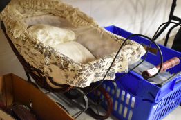 A vintage childrens toy pram