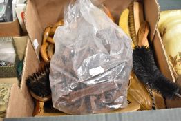 A large collection of wooden dress and crumb brushes also a pack of bakelite carpet grips