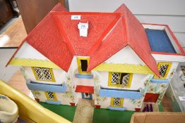 A Conway Valley Two Storey Dolls House containing furniture and fittings