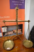 A fine set of antique bankers or apothecary balance scales by William and sons brass cast