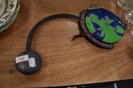 A 20th century folk art style novelty balance decoration with motor car and ship racing round the