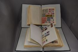 A pair of albums containing world and UK interest stamps