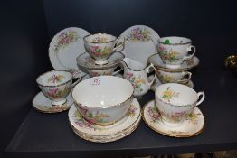A porcelain part tea service by Staffordshire bone china in a floral print