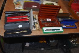 A selection of ball point and fountain ink pens including Shaeffer, Parker and Paper Mate