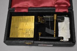 A set of miniature scientific scales by J. Casartelli of Salford