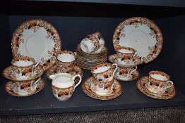 A late Victorian part tea service in an imari pattern marked Daisy SCH