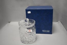 A Waterford cut-crystal biscuit barrel, complete with branded Waterford box.