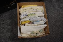 A mixed selection of vintage and retro textiles including tea towel, pillow cases and more.