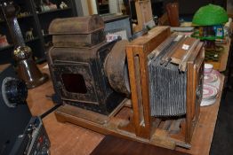 A Victorian oak cased magic lantern slide projector