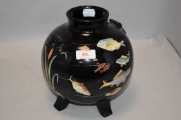 An aesthetic period Jackfield vase having black ground with intricate hand painted fish and bull