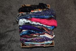 A box of headscarves and accessories.