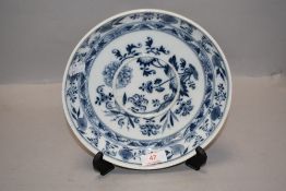 A late Victorian porcelain plate bearing crossed swords mark for Meissen decorated with flowers