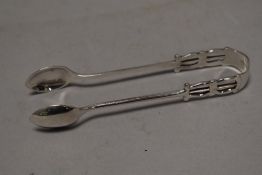 A pair of stylised sugar nips, marked L & W S.
