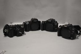 Four Canon camera bodies including Canon EOS 100, EOS 350D, EOS 30 and a G5 Powershot with remote
