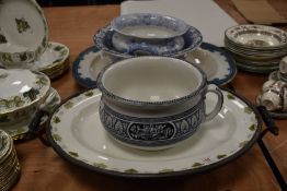 A selection of bowls and two large ceramic chargers