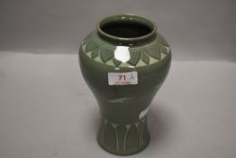 A 20th century Korean celadon glazed vase decorated with storks