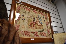 A mid Victorian embroidery work of two people fishing with floral border dated 1852