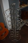 A modern chrome framed wine or bottle rack