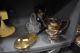 An antique brass and cast chestnut roaster, a cut glass bowl and part silver plated tea set