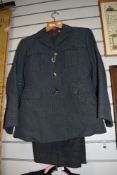A 1954 dated pair of RAF trousers having button fly, jacket of similar age included.