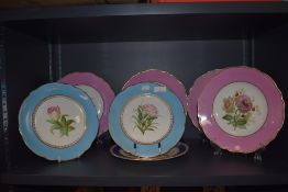 A set of six late Victorian porcelain dinner plates hand decorated with flowers