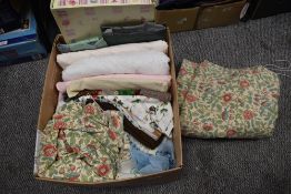 A mixed box of vintage and retro textiles including curtains and table linen.