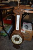 An aneroid and mercury barometer having enamel face dial