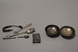 A silver-mounted cigarette lighter, silver butter knife and silver spoon, together with two
