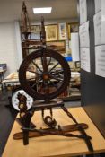 An antique mid Victorian wool spinning wheel partially complete