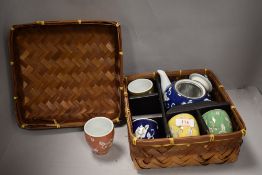 A Chinese styled picnic tea set with harlequin pattern design