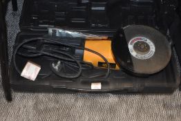 An as new JCB electric disk grinder with case