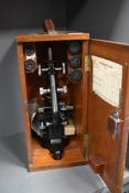 A 20th century scientific microscope by W.Watson no.115512 Kima in fitted case with lens'