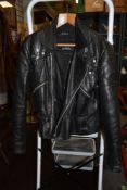 A vintage leather motor cycle jacket by Le Biker AJS lettering to back