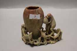 A Chinese carved-soapstone spill vase, the ovoid vase with engraved detail, the base ornamented with