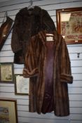 A full length fur coat having Marshall and Snelgrove,Southport label.