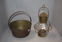 A converted Victorian storm lantern having copper case with blown glass and a jam pan