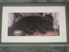 (20th century), a print, black cat, 25 x 54cm, mounted framed and glazed, 47 x 76cm