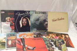 A lot of eleven unplayed albums - these were sourced from a record shop and have been stored